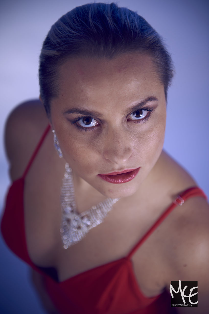 CLOSE-UP PORTRAIT OF YOUNG WOMAN WITH EYES CLOSED