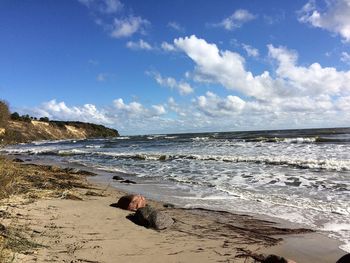 Scenic view of beach against sky