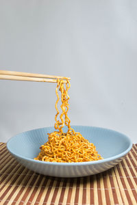 Close-up of pasta in plate on table