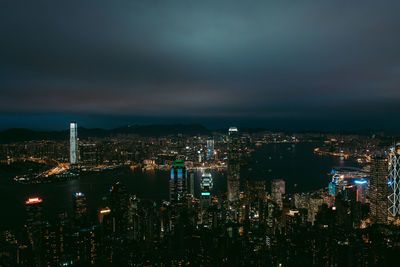 High angle view of illuminated buildings in city at night