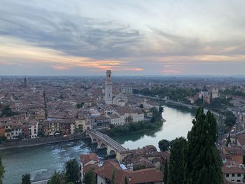 High angle view of river amidst buildings in city