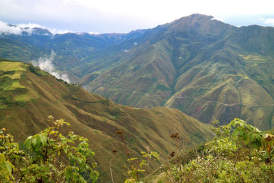 Scenic view of mountains against sky