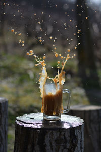 Close-up of water splashing on table