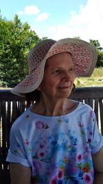 Smiling senior woman wearing hat