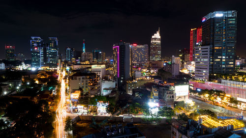 Illuminated buildings in city at night