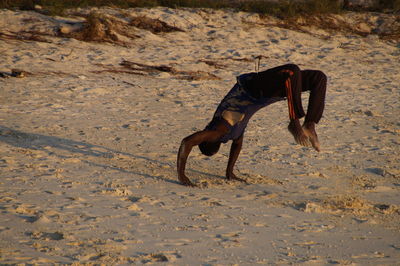 Man on sand at beach