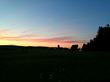 Scenic view of landscape at sunset