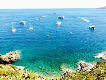 High angle view of sea against blue sky