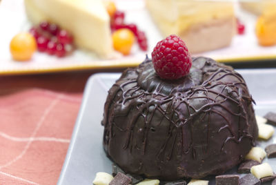 Delicious chocolate cake with fresh raspberry