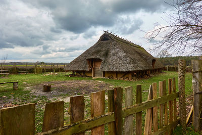 Historical traditional house with deep thatched roof