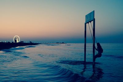 Scenic view of sea at sunset