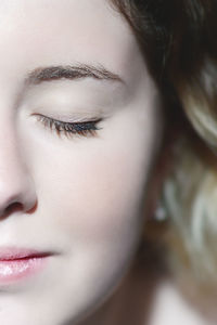 Close-up portrait of young woman