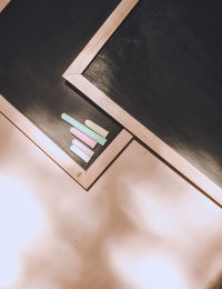 High angle view of open book on table at home
