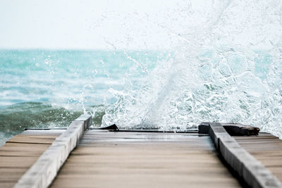 Scenic view of swimming pool by sea