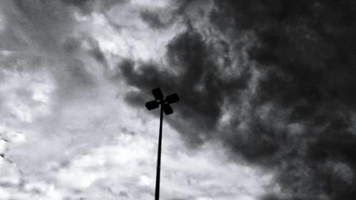 Low angle view of street light against sky