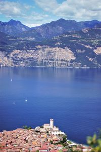 High angle view of townscape by sea