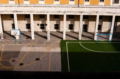 High angle view of soccer field outside building