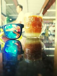 Close-up of glasses on table