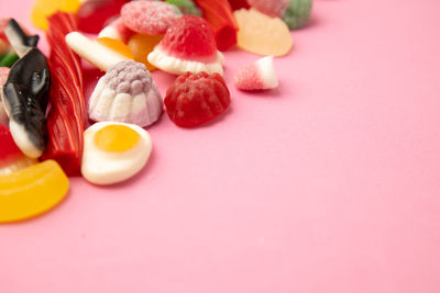 High angle view of multi colored candies on table