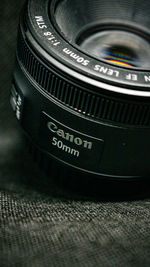 Close-up of camera on table
