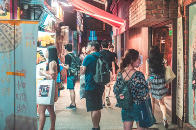 Group of people walking in city