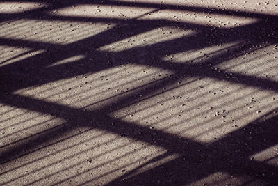 High angle view of shadow on street