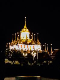 Low angle view of illuminated temple