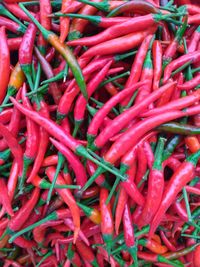 Full frame shot of red chili peppers for sale at market