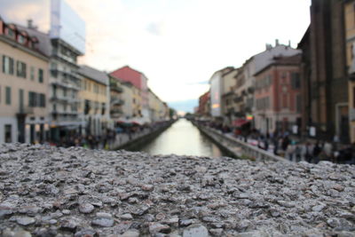 High angle view of river amidst buildings in city