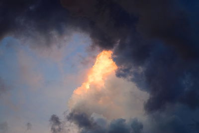 Low angle view of dramatic sky during sunset