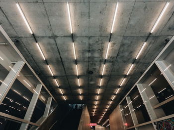 Low angle view of illuminated subway station