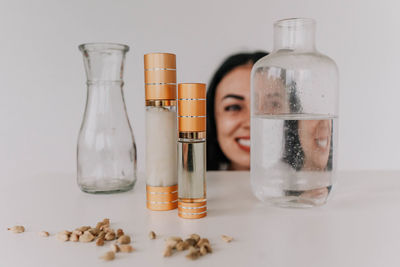 Close-up of bottles on white background