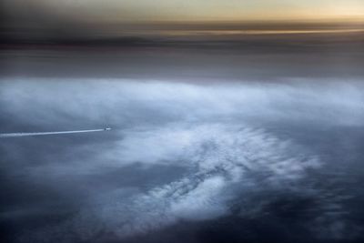 Aerial view of vapor trails in sky