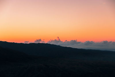 Scenic view of mountain against sky during sunset