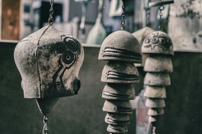 Close-up of clothes hanging on metal