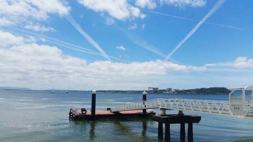 Pier over sea against sky
