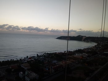 Scenic view of sea against sky at dusk