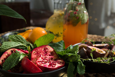 Close-up of fruits in plate on table