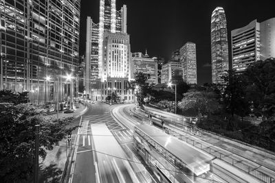 High angle view of light trails on road at night