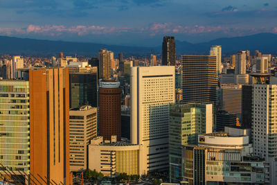 Aerial view of cityscape at sunset