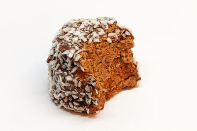 Close-up of bread against white background