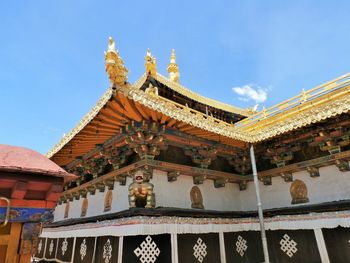 Low angle view of temple building against sky