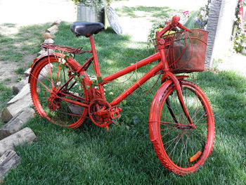 Abandoned bicycle on field