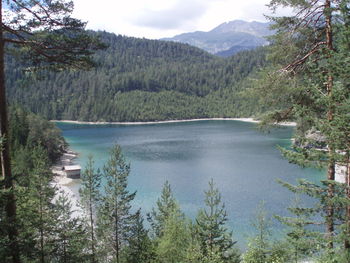 Scenic view of lake with mountains in background