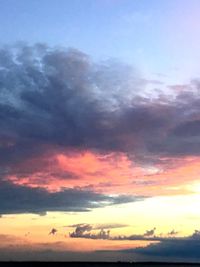 Low angle view of dramatic sky during sunset