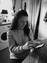 High angle view of woman using phone