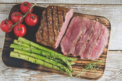 High angle view of vegetables on cutting board