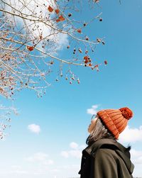 Low angle view of tree against sky during winter