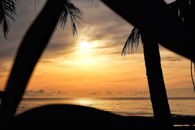 Scenic view of sea against sky at sunset