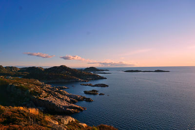 Scenic view of sea against sky during sunset